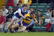 26 June 2004; Barry Murphy, Clare, in action against Cyril Cuddy, Laois. Guinness Senior Hurling Championship Qualifier, Round 1, Clare v Laois, Gaelic Grounds, Limerick. Picture credit; Ray McManus / SPORTSFILE