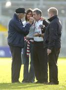 3 July 2004; Tyrone manager Mickey Harte with his daughter Michaela is interviewed after the match by Michael McGee, left, Highland Radio and Kenny Curran, editor of &quot;The Game&quot;. Bank of Ireland Football Championship Qualifier, Round 2, Down v Tyrone, Pairc an Iuir, Newry, Co. Down. Picture credit; Damien Eagers / SPORTSFILE