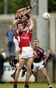 3 July 2004; Joe Bergin, Galway, in action against Paudie Mallon, Louth. Bank of Ireland Football Championship Qualifier, Round 2, Galway v Louth, Parnell Park, Dublin. Picture credit; SPORTSFILE