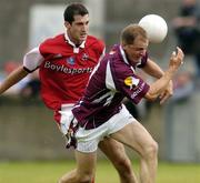 3 July 2004; Michael Donnellan, Galway, in action against David Devaney, Louth. Bank of Ireland Football Championship Qualifier, Round 2, Galway v Louth, Parnell Park, Dublin. Picture credit; SPORTSFILE