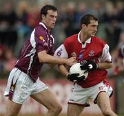 3 July 2004; Joe Bergin, Galway, in action against David Devaney, Louth. Bank of Ireland Football Championship Qualifier, Round 2, Galway v Louth, Parnell Park, Dublin. Picture credit; SPORTSFILE