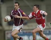 3 July 2004; Joe Bergin, Galway, in action against Derek Shevlin, Louth. Bank of Ireland Football Championship Qualifier, Round 2, Galway v Louth, Parnell Park, Dublin. Picture credit; SPORTSFILE