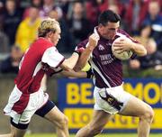 3 July 2004; Padraic Joyce, Galway, in action against Simon Gerard, Louth. Bank of Ireland Football Championship Qualifier, Round 2, Galway v Louth, Parnell Park, Dublin. Picture credit; SPORTSFILE