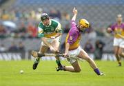 4 July 2004; Eoin Quigley, Wexford, in action against Brian Whelahan, Offaly. Guinness Leinster Senior Hurling Championship Final, Offaly v Wexford, Croke Park, Dublin. Picture credit; Pat Murphy / SPORTSFILE