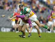 4 July 2004; Rory McCarthy, Wexford, in action against Gary Hanniffy, Offaly. Guinness Leinster Senior Hurling Championship Final, Offaly v Wexford, Croke Park, Dublin. Picture credit; Brendan Moran / SPORTSFILE