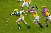 4 July 2004; Niall Claffey, Offaly, in action against Tomas Mahon, and Eoin Quigley, right, Wexford. Guinness Leinster Senior Hurling Championship Final, Offaly v Wexford, Croke Park, Dublin. Picture credit; Pat Murphy / SPORTSFILE
