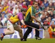 4 July 2004; Brian Mullins, Offaly goalkeeper, in action against Michael Jacob, Wexford. Guinness Leinster Senior Hurling Championship Final, Offaly v Wexford, Croke Park, Dublin. Picture credit; Damien Eagers / SPORTSFILE