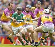 4 July 2004; Damien Murray, Offaly, in action against Darragh Ryan, left, Malachy Travers and David O'Connor (4), Wexford. Guinness Leinster Senior Hurling Championship Final, Offaly v Wexford, Croke Park, Dublin. Picture credit; Brendan Moran / SPORTSFILE