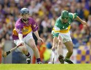 4 July 2004; Barry Teehan, Offaly, in action against Rory Jacob, Wexford. Guinness Leinster Senior Hurling Championship Final, Offaly v Wexford, Croke Park, Dublin. Picture credit; Brendan Moran / SPORTSFILE