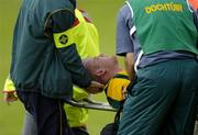 3 July 2004; Shane McKeigue, Meath, is stretchered from the field after sustaining an injury. Bank of Ireland Football Championship Qualifier, Round 2, Fermanagh v Meath, Brewster Park, Enniskillen, Co. Fermanagh. Picture credit; Brendan Moran / SPORTSFILE