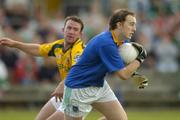 3 July 2004; Niall Tinney, Fermanagh, in action against Evan Kelly, Meath. Bank of Ireland Football Championship Qualifier, Round 2, Fermanagh v Meath, Brewster Park, Enniskillen, Co. Fermanagh. Picture credit; Brendan Moran / SPORTSFILE