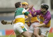 4 July 2004; Colm Cassidy, Offaly, in action against Michael Jacob, right, and Eoin Quigley, Wexford. Guinness Leinster Senior Hurling Championship Final, Offaly v Wexford, Croke Park, Dublin. Picture credit; Damien Eagers / SPORTSFILE