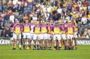 4 July 2004; The Wexford team stand for the national anthem. Guinness Leinster Senior Hurling Championship Final, Offaly v Wexford, Croke Park, Dublin. Picture credit; Pat Murphy / SPORTSFILE