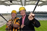 28 August 2013; The Sunday Game Presenter Michael Lyster was joined today in Croke Park by motor neurone disease (MND) sufferer Paul Lannon and friends sporting their county colours to encourage others from across Ireland to abseil 100ft off the Hogan Stand in aid of the Irish Motor Neurone Disease Association (IMNDA). At the event is Michael Lyster with Paul Lannon, from Knocktopher, Co. Kilkenny, left. Croke Park, Dublin. Picture credit: Brian Lawless / SPORTSFILE