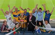 28 August 2013; The Sunday Game Presenter Michael Lyster was joined today in Croke Park by motor neurone disease (MND) sufferer Paul Lannon and friends sporting their county colours to encourage others from across Ireland to abseil 100ft off the Hogan Stand in aid of the Irish Motor Neurone Disease Association (IMNDA). At the event is Michael Lyster, Paul Lannon, from Knocktopher, Co. Kilkenny, and GAA supporters. Croke Park, Dublin. Picture credit: Brian Lawless / SPORTSFILE