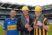 28 August 2013; The Sunday Game Presenter Michael Lyster was joined today in Croke Park by motor neurone disease (MND) sufferer Paul Lannon and friends sporting their county colours to encourage others from across Ireland to abseil 100ft off the Hogan Stand in aid of the Irish Motor Neurone Disease Association (IMNDA). At the event is Michael Lyster and Paul Lannon, from Knocktopher, Co. Kilkenny, with Tipperary supporter Evan Farrell. Croke Park, Dublin. Picture credit: Brian Lawless / SPORTSFILE