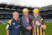 28 August 2013; The Sunday Game Presenter Michael Lyster was joined today in Croke Park by motor neurone disease (MND) sufferer Paul Lannon and friends sporting their county colours to encourage others from across Ireland to abseil 100ft off the Hogan Stand in aid of the Irish Motor Neurone Disease Association (IMNDA). At the event is Michael Lyster with Paul Lannon, from Knocktopher, Co. Kilkenny, and YYYY. Croke Park, Dublin. Picture credit: Brian Lawless / SPORTSFILE
