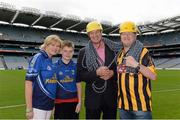 28 August 2013; The Sunday Game Presenter Michael Lyster was joined today in Croke Park by motor neurone disease (MND) sufferer Paul Lannon and friends sporting their county colours to encourage others from across Ireland to abseil 100ft off the Hogan Stand in aid of the Irish Motor Neurone Disease Association (IMNDA). At the event is Michael Lyster with Paul Lannon, from Knocktopher, Co. Kilkenny, left. Croke Park, Dublin. Picture credit: Brian Lawless / SPORTSFILE