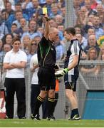 1 September 2013; Dublin goalkeeper and captain Stephen Cluxton is shown a yellow card by referee Cormac Reilly for a foul which resulted in a penalty to Kerry. GAA Football All-Ireland Senior Championship, Semi-Final, Dublin v Kerry, Croke Park, Dublin. Picture credit: Brendan Moran / SPORTSFILE