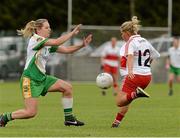 1 September 2013; Nuala Browne, Derry, in action against Niamh Malone, Offaly. All-Ireland Ladies Football Junior Championship, Semi-Final, Offaly v Derry, Carrickmacross Emmets GAA Club, Emmet Park, Monaghan. Picture credit: Oliver McVeigh / SPORTSFILE