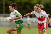 1 September 2013; Amy Kerrigan, Offaly, in action against Ashelene Groogan, Derry. All-Ireland Ladies Football Junior Championship, Semi-Final, Offaly v Derry, Carrickmacross Emmets GAA Club, Emmet Park, Monaghan. Picture credit: Oliver McVeigh / SPORTSFILE