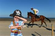 3 September 2013; Four year old Reuben Stafford, from Laytown, Co. Meath, before the start of the Neptune Claiming Race. Laytown Races, Laytown, Co. Meath. Picture credit: Brian Lawless / SPORTSFILE
