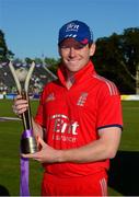 3 September 2013; England captain Eoin Morgan with the RSA Challenge trophy after the game. The RSA Challenge ODI, Ireland v England, Malahide Cricket Club, Malahide, Co. Dublin. Photo by Sportsfile