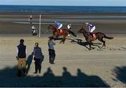 3 September 2013; Runners and riders make their way to the start of the O'Neills Sports Handicap. Laytown Races, Laytown, Co. Meath. Picture credit: Brian Lawless / SPORTSFILE