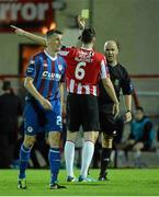 3 September 2013; Shane McEleney, Derry City, is shown a yellow card by referee Tomas Connolly. Airtricity League Premier Division, Derry City v St Patrick’s Athletic, Brandywell Stadium, Derry. Picture credit: Oliver McVeigh / SPORTSFILE