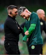10 September 2023; Aaron Connolly of Republic of Ireland receives medical attention for an injury from Kevin Mulholland before the UEFA EURO 2024 Championship qualifying group B match between Republic of Ireland and Netherlands at the Aviva Stadium in Dublin. Photo by Stephen McCarthy/Sportsfile