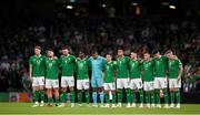 10 September 2023; Republic of Ireland players take part in a moments silence for the victims in the Morocco earthquake before the UEFA EURO 2024 Championship qualifying group B match between Republic of Ireland and Netherlands at the Aviva Stadium in Dublin. Photo by Stephen McCarthy/Sportsfile