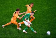 10 September 2023; Jason Knight of Republic of Ireland in action against Mats Wieffer, left, and Donyell Malen of Netherlands during the UEFA EURO 2024 Championship qualifying group B match between Republic of Ireland and Netherlands at the Aviva Stadium in Dublin. Photo by Ben McShane/Sportsfile