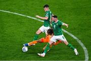 10 September 2023; Xavi Simons of Netherlands is tackled by Alan Browne, right, and Jason Knight of Republic of Ireland during the UEFA EURO 2024 Championship qualifying group B match between Republic of Ireland and Netherlands at the Aviva Stadium in Dublin. Photo by Ben McShane/Sportsfile