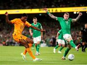 10 September 2023; Denzel Dumfries of Netherlands in action against James McClean of Republic of Ireland during the UEFA EURO 2024 Championship qualifying group B match between Republic of Ireland and Netherlands at the Aviva Stadium in Dublin. Photo by Michael P Ryan/Sportsfile