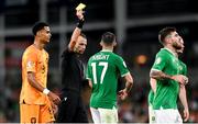 10 September 2023; Jason Knight of Republic of Ireland is shown a yellow card by referee Irfan Peljto during the UEFA EURO 2024 Championship qualifying group B match between Republic of Ireland and Netherlands at the Aviva Stadium in Dublin. Photo by Stephen McCarthy/Sportsfile