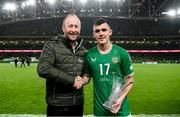 10 September 2023; Jason Knight of Republic of Ireland is presented with the Carlsberg man of the match award by Diageo head of sponsorship Rory Sheridan after the UEFA EURO 2024 Championship qualifying group B match between Republic of Ireland and Netherlands at the Aviva Stadium in Dublin. Photo by Stephen McCarthy/Sportsfile