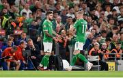10 September 2023; Ryan Manning of Republic of Ireland, left, comes on as a substitution for teammate James McClean, right, during the UEFA EURO 2024 Championship qualifying group B match between Republic of Ireland and Netherlands at the Aviva Stadium in Dublin. Photo by Seb Daly/Sportsfile