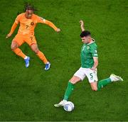 10 September 2023; John Egan of Republic of Ireland and Xavi Simons of Netherlands during the UEFA EURO 2024 Championship qualifying group B match between Republic of Ireland and Netherlands at the Aviva Stadium in Dublin. Photo by Ben McShane/Sportsfile
