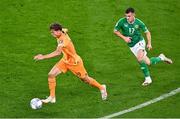 10 September 2023; Mats Wieffer of Netherlands and Jason Knight of Republic of Ireland during the UEFA EURO 2024 Championship qualifying group B match between Republic of Ireland and Netherlands at the Aviva Stadium in Dublin. Photo by Ben McShane/Sportsfile