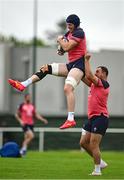 12 September 2023; Ryan Baird is lifted by Rob Herring during an Ireland rugby squad training session at Complexe de la Chambrerie in Tours, France. Photo by Brendan Moran/Sportsfile