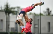 12 September 2023; Ryan Baird is lifted by Rob Herring during an Ireland rugby squad training session at Complexe de la Chambrerie in Tours, France. Photo by Brendan Moran/Sportsfile