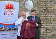 12 September 2023; Remembrance Run 5K Founder Frank Greally presents a hoodie to Sport Ireland chairperson John Foley at Phoenix Park Visitor Centre in Dublin for the official launch of the Remembrance Run 5k supported by Silver Stream Healthcare which takes place in the Phoenix Park on Sunday, November 12th, 2023. Further information available at www.remembrancerun.ie. Photo by Sam Barnes/Sportsfile