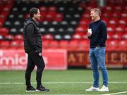 15 September 2023; Derry City manager Ruaidhrí Higgins, left, and former Dundalk manager Vinny Perth before the SSE Airtricity Men's Premier Division match between Derry City and Shamrock Rovers at The Ryan McBride Brandywell Stadium in Derry. Photo by Stephen McCarthy/Sportsfile