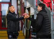 15 September 2023; Graham Burke of Shamrock Rovers, left, and Derry City manager Ruaidhrí Higgins before the SSE Airtricity Men's Premier Division match between Derry City and Shamrock Rovers at The Ryan McBride Brandywell Stadium in Derry. Photo by Stephen McCarthy/Sportsfile