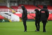 15 September 2023; Referee Eoghan O’Shea, left, and his officials inspect the pitch before the Sports Direct Men’s FAI Cup quarter-final match between Cork City and Wexford at Turner's Cross in Cork. Photo by Eóin Noonan/Sportsfile