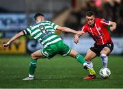 15 September 2023; Ben Doherty of Derry City in action against Ronan Finn of Shamrock Rovers during the SSE Airtricity Men's Premier Division match between Derry City and Shamrock Rovers at The Ryan McBride Brandywell Stadium in Derry. Photo by Stephen McCarthy/Sportsfile