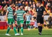 15 September 2023; Daniel Cleary of Shamrock Rovers, left, and team-mate Richie Towell protest to referee Paul McLaughlin during the SSE Airtricity Men's Premier Division match between Derry City and Shamrock Rovers at The Ryan McBride Brandywell Stadium in Derry. Photo by Stephen McCarthy/Sportsfile
