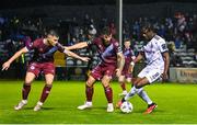 15 September 2023; Jonathan Afolabi of Bohemians in action against Gary Deegan, centre, and Evan Weir of Drogheda United during the Sports Direct Men’s FAI Cup quarter-final match between Drogheda United and Bohemians at Weavers Park in Drogheda, Louth. Photo by Seb Daly/Sportsfile