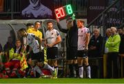15 September 2023; Dundalk players, from left, Robbie McCourt, Robbie Benson and Greg Sloggett prepare to come on for a triple-substitution in the 34th minute during the Sports Direct Men’s FAI Cup quarter-final match between Galway United and Dundalk at Eamonn Deacy Park in Galway. Photo by Ben McShane/Sportsfile