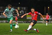 15 September 2023; Michael Duffy of Derry City in action against Ronan Finn of Shamrock Rovers during the SSE Airtricity Men's Premier Division match between Derry City and Shamrock Rovers at The Ryan McBride Brandywell Stadium in Derry. Photo by Stephen McCarthy/Sportsfile